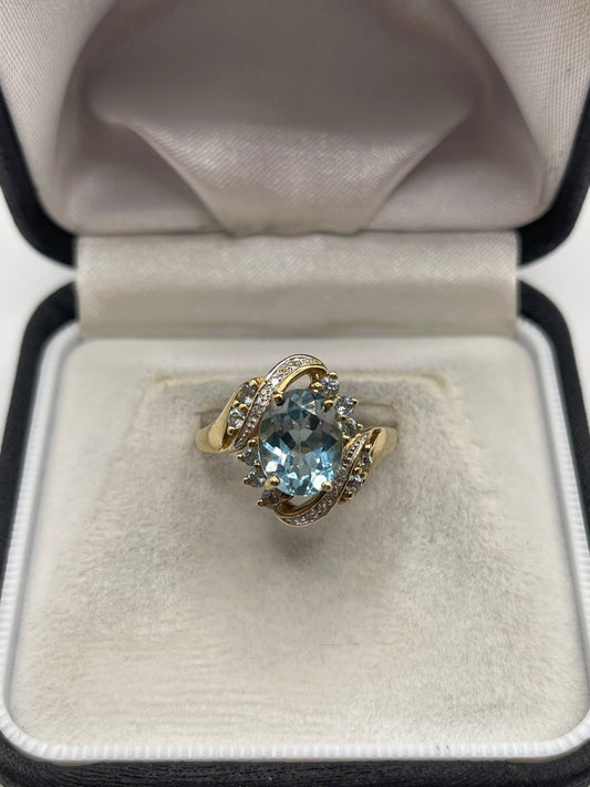 9ct gold blue topaz and diamond ring