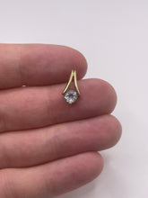 Load image into Gallery viewer, 9ct gold blue topaz pendant
