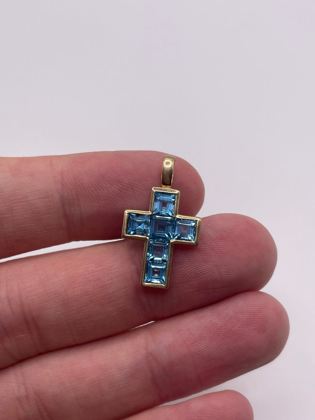 9ct gold blue topaz cross pendant