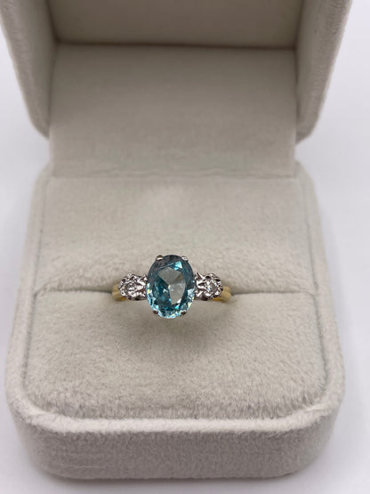 18ct gold blue zircon and diamond ring