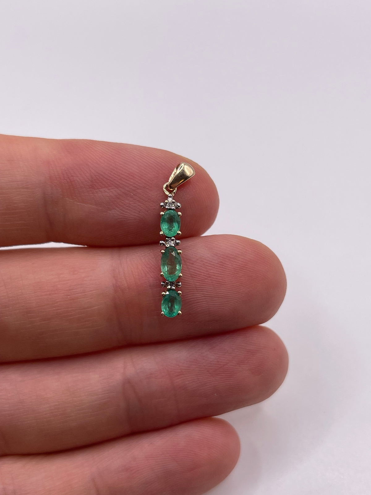 9ct gold emerald and diamond pendant