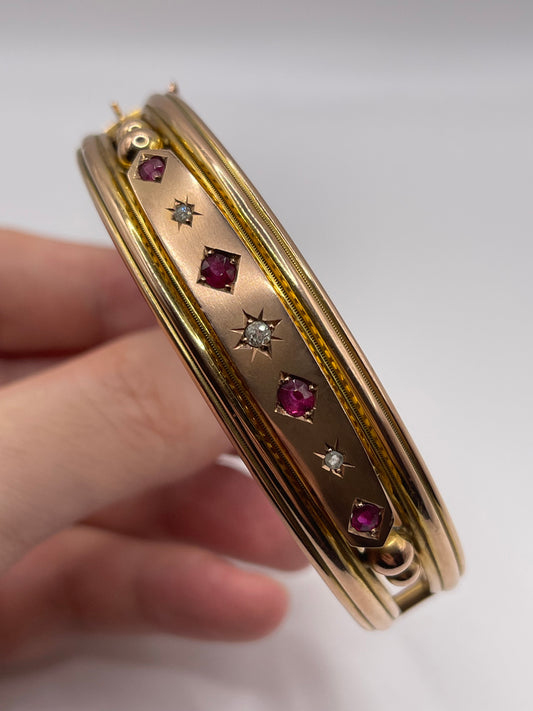 Antique 9ct rose gold ruby and diamond bangle