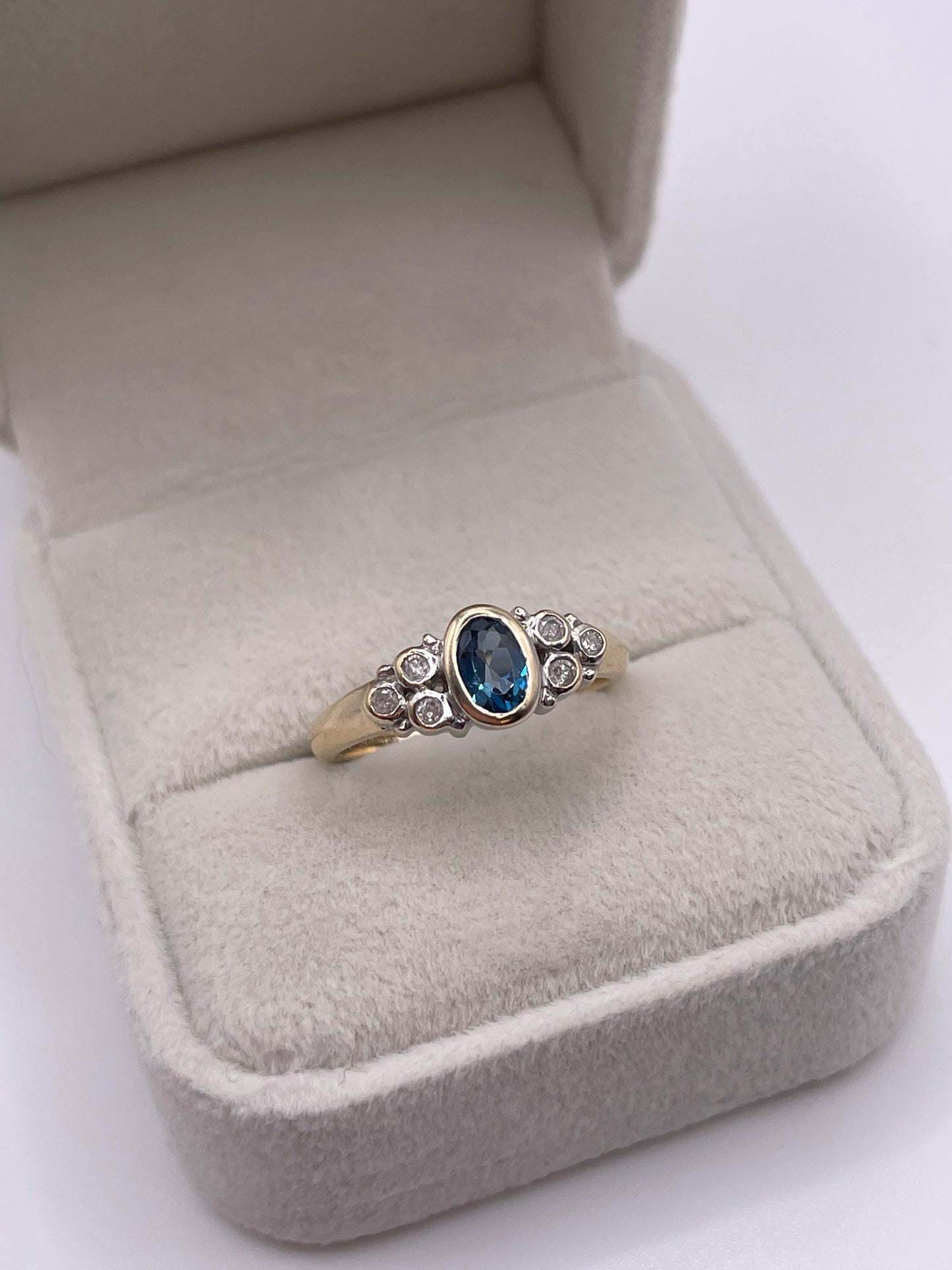 9ct gold blue topaz and diamond ring