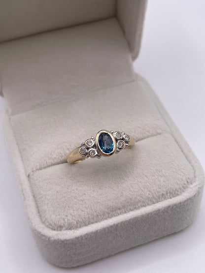 9ct gold blue topaz and diamond ring