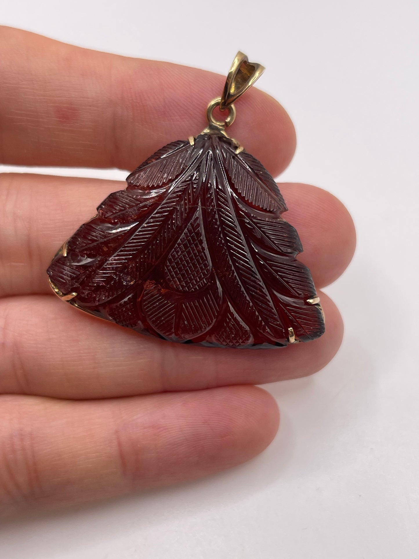 9ct gold carved tourmaline pendant