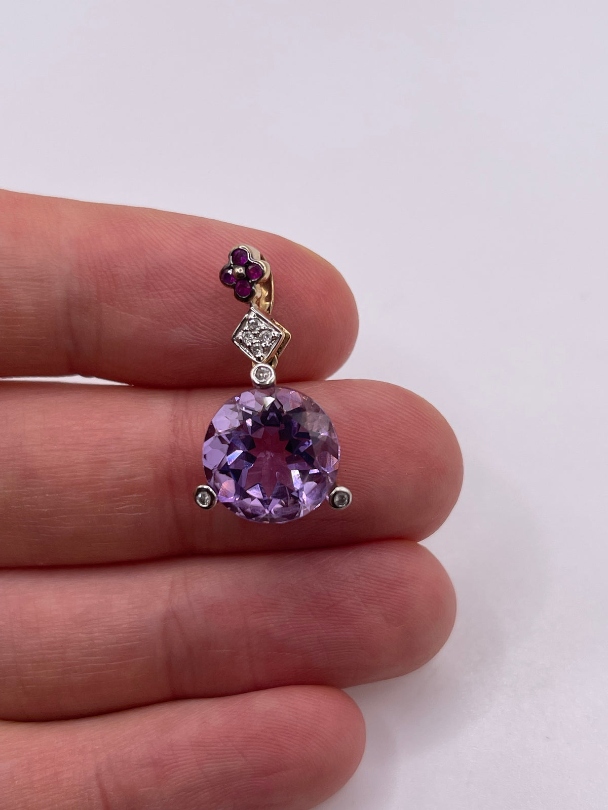 9ct gold amethyst, ruby and diamond pendant