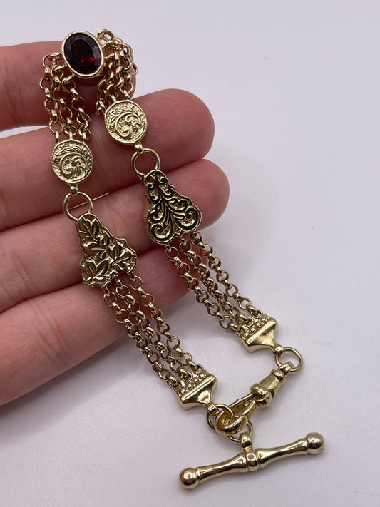 9ct gold garnet bracelet