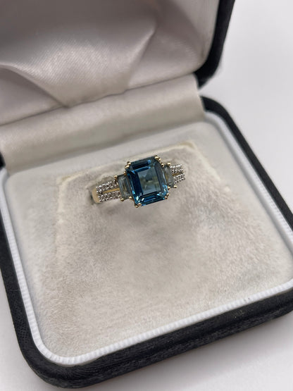 9ct gold blue topaz and diamond ring