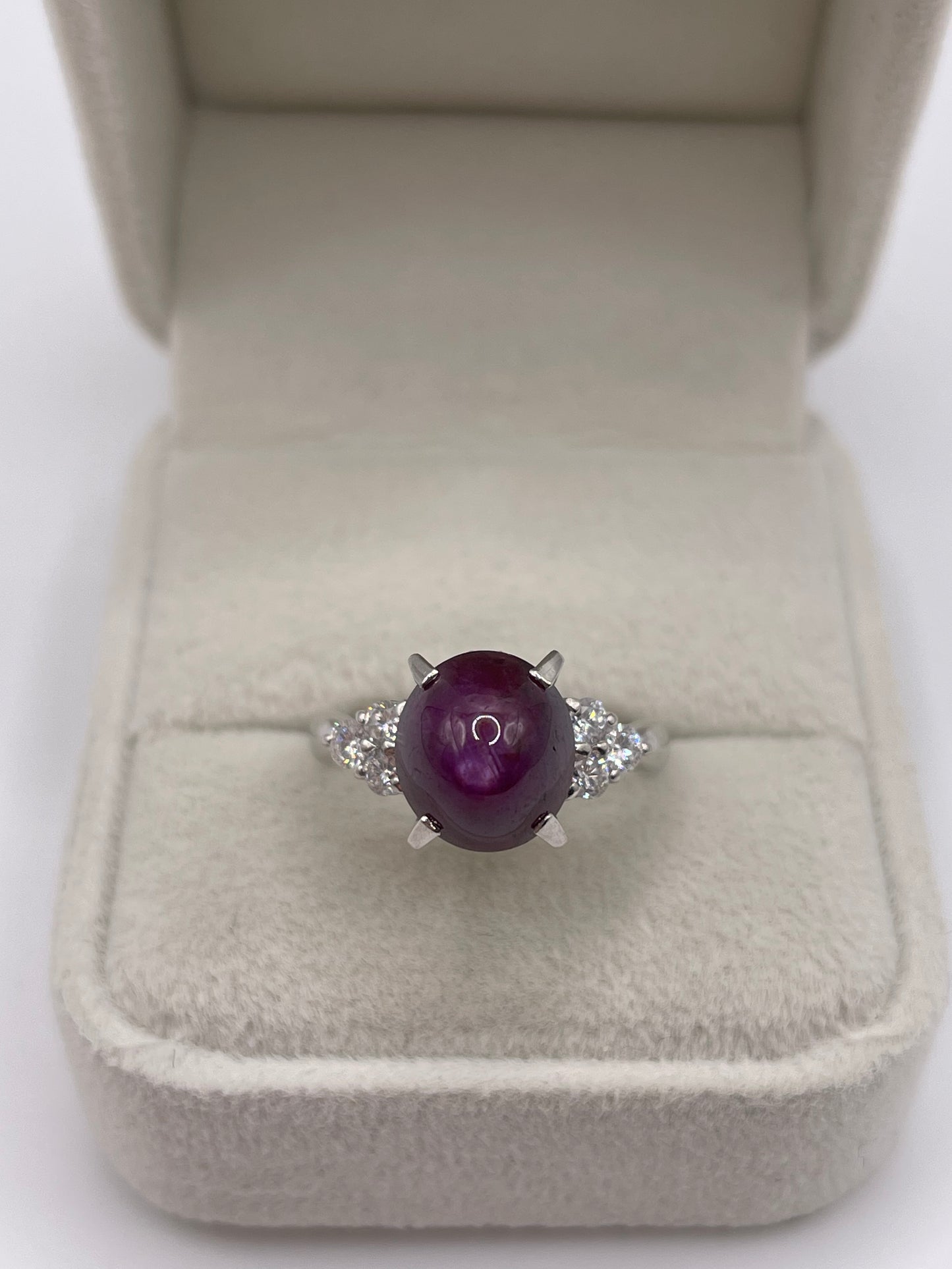 Platinum star ruby and diamond ring
