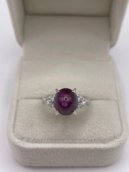 Platinum star ruby and diamond ring