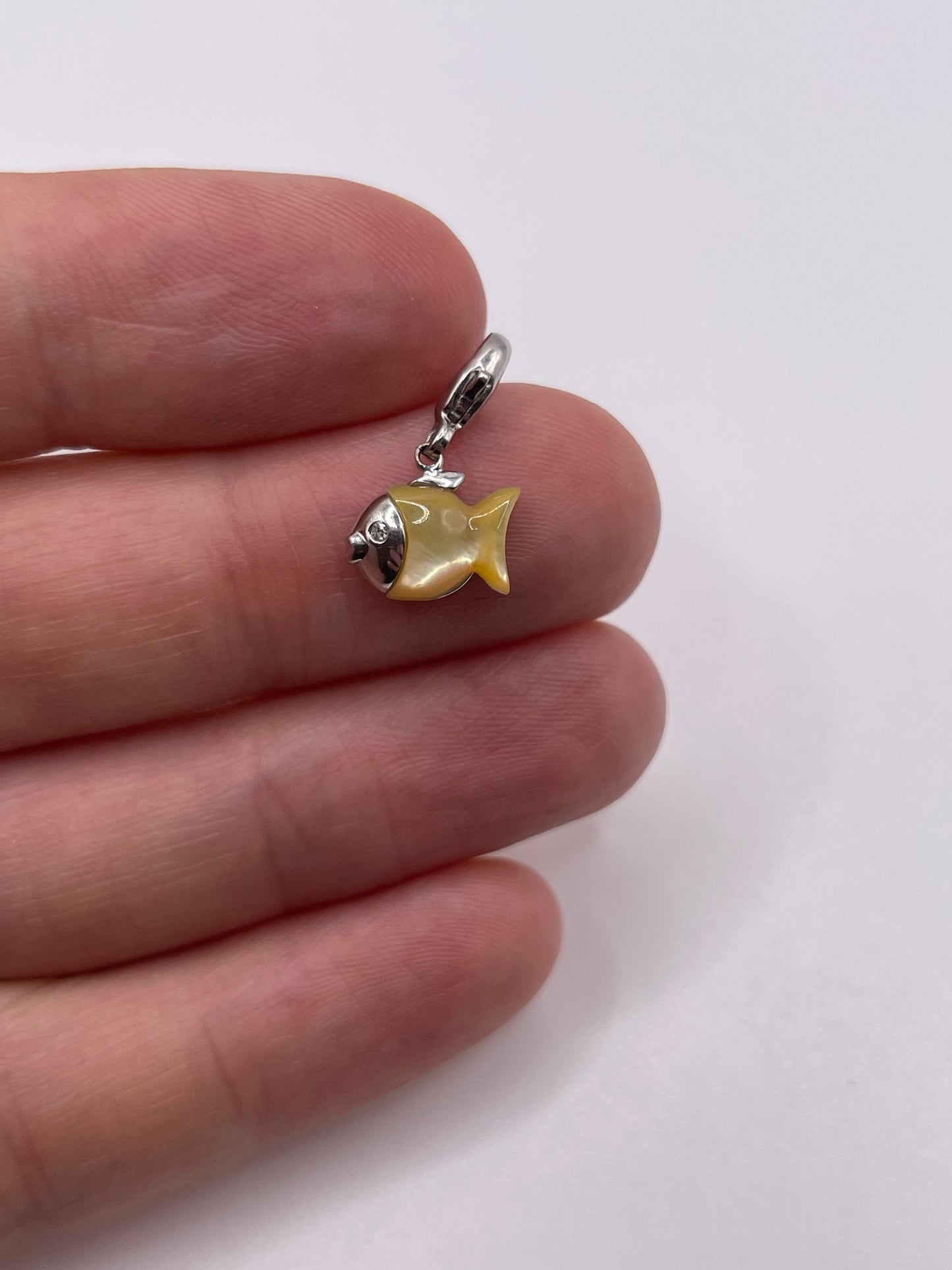 9ct gold mother of pearl and diamond fish pendant