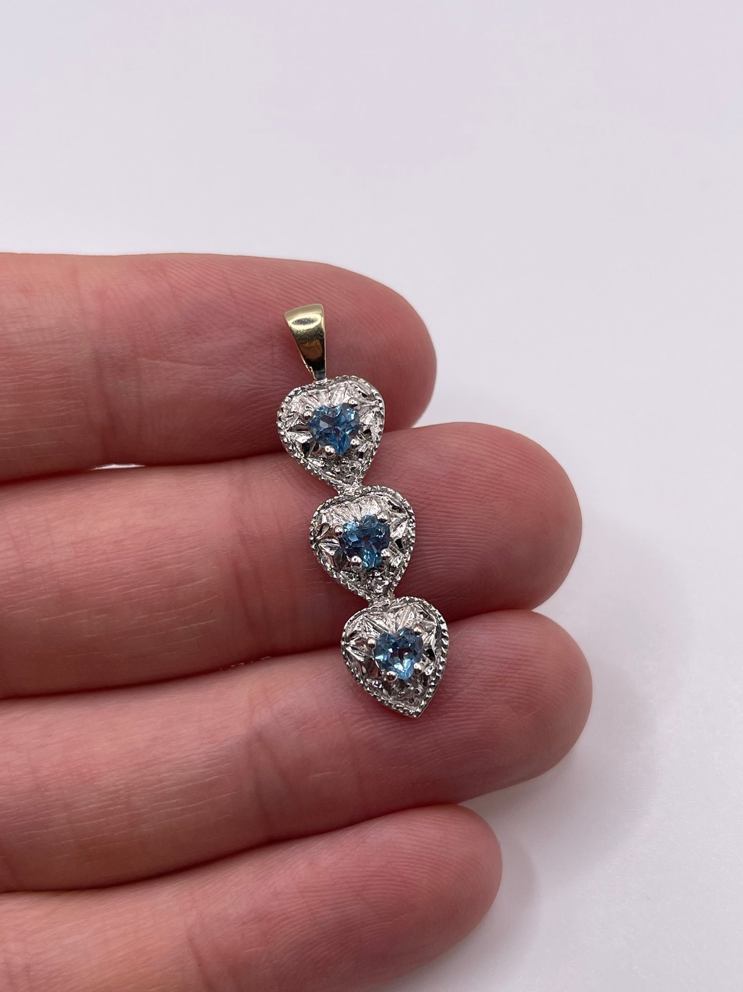 9ct gold topaz and diamond pendant