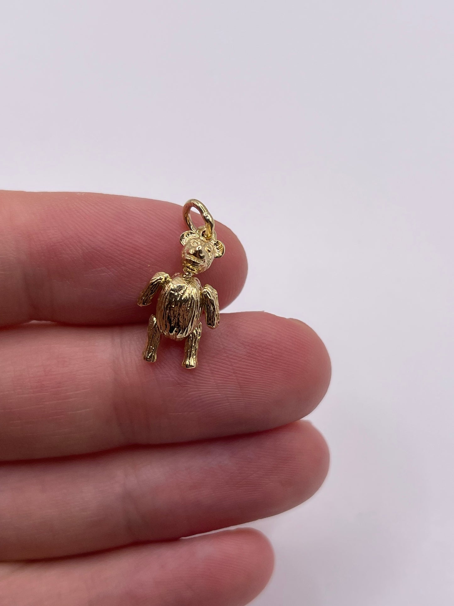 9ct gold articulated bear pendant