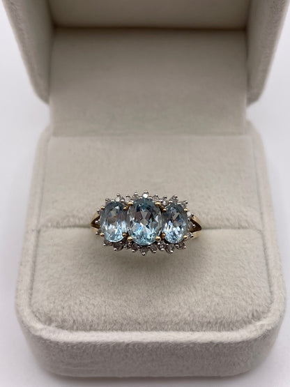 9ct gold blue topaz and diamond ring