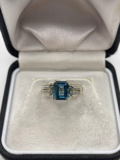 9ct gold blue topaz and diamond ring
