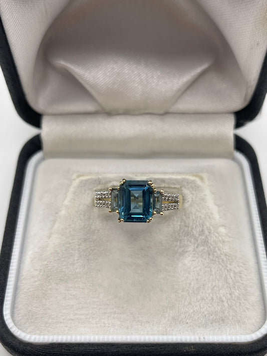 9ct gold blue topaz and diamond ring