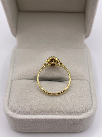 18ct gold emerald and diamond ring
