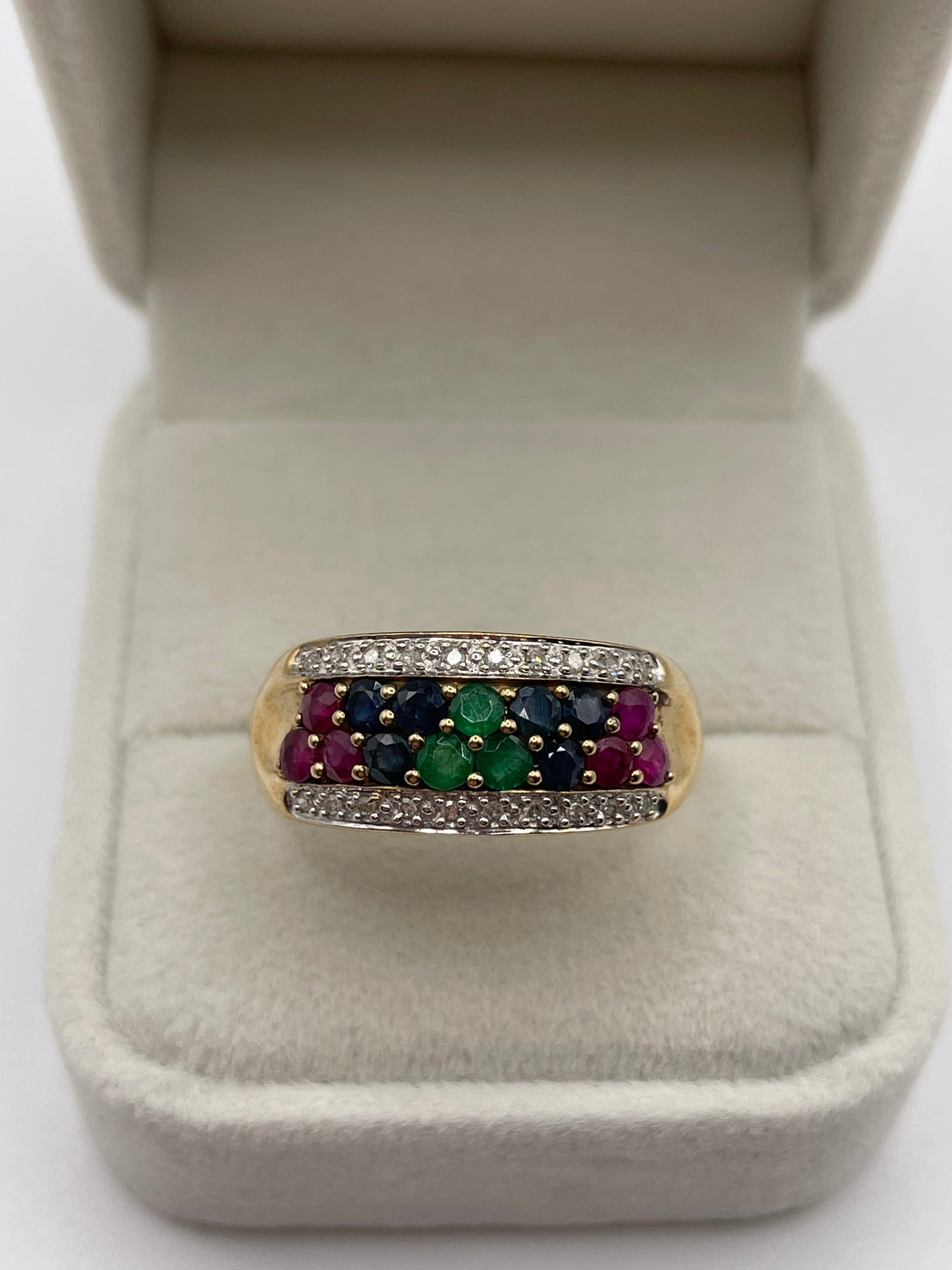 9ct gold emerald, sapphire, ruby and diamond ring