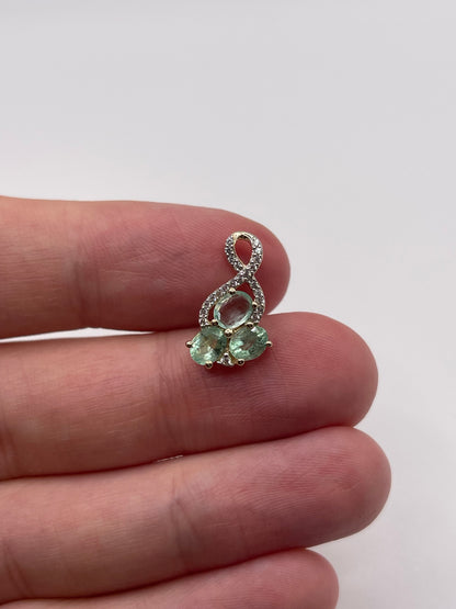 9ct gold green kyanite and zircon pendant