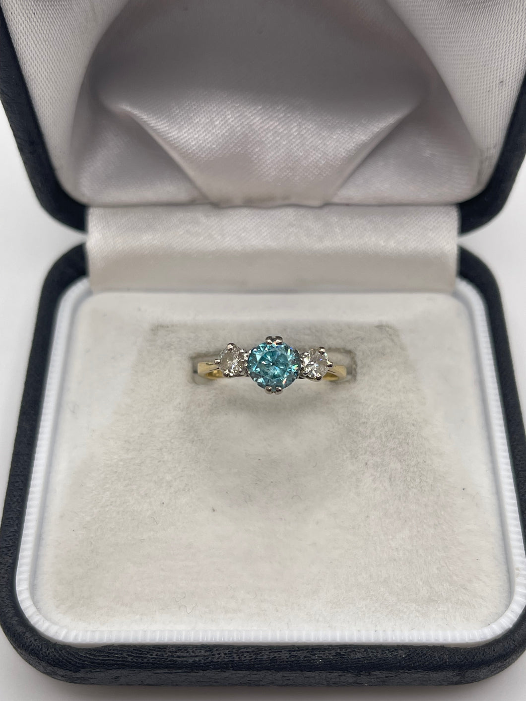 18ct gold blue zircon and diamond ring