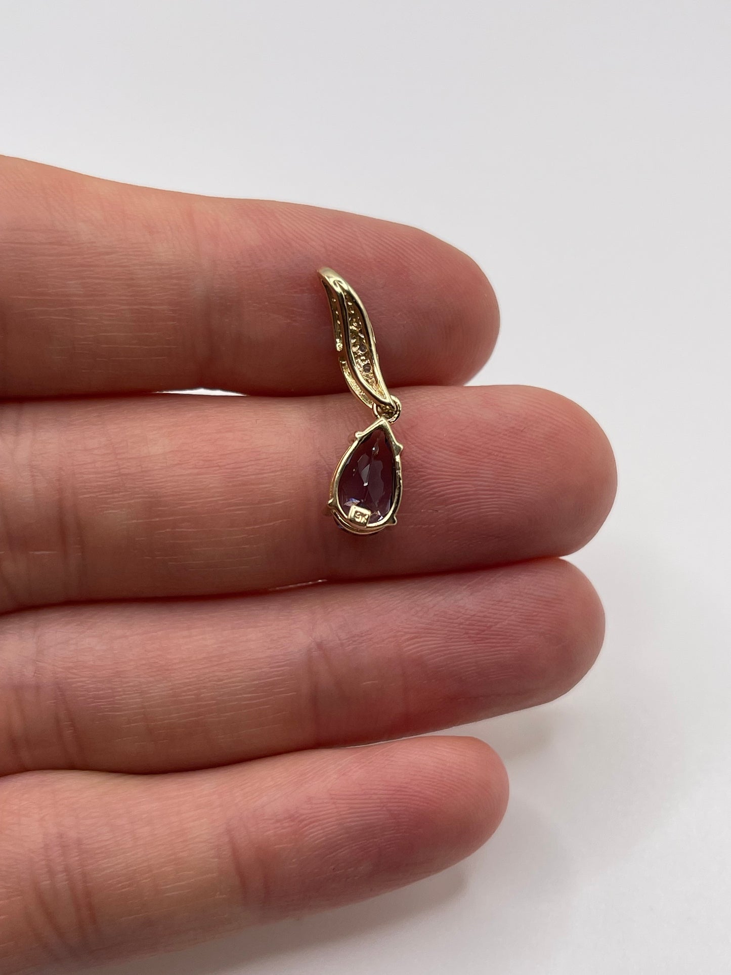 9ct gold iolite and diamond pendant