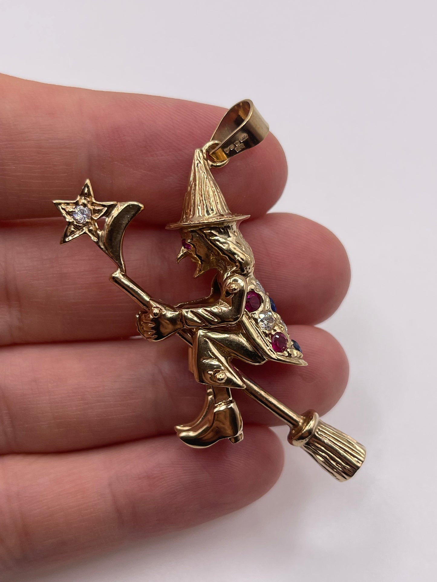 9ct gold articulated witch pendant