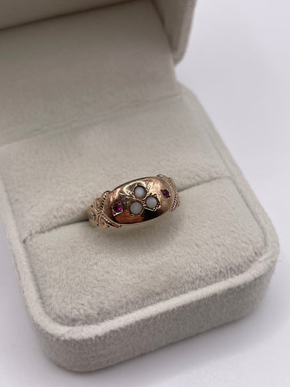 Antique 9ct rose gold garnet and pearl ring