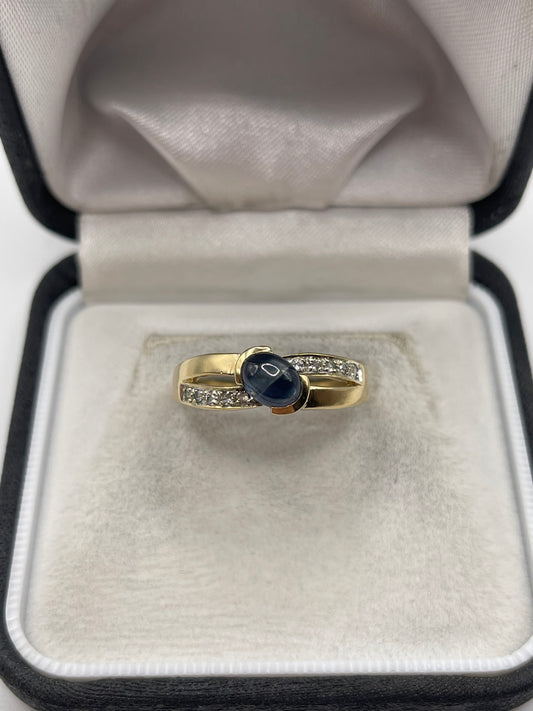 9ct gold cabochon sapphire and zircon ring