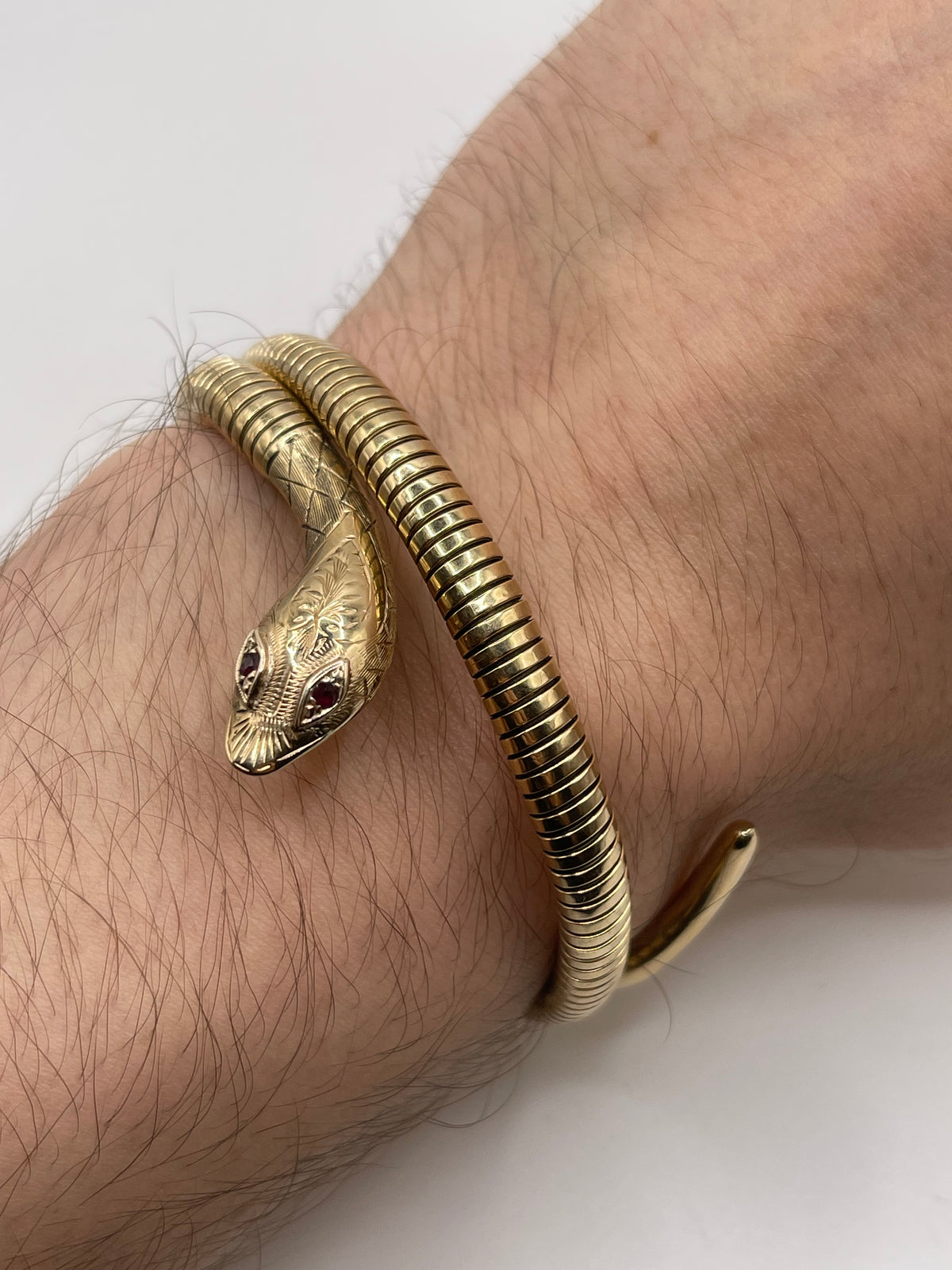 9ct gold garnet snake bangle