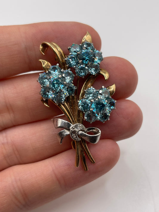 9ct gold blue zircon and diamond brooch