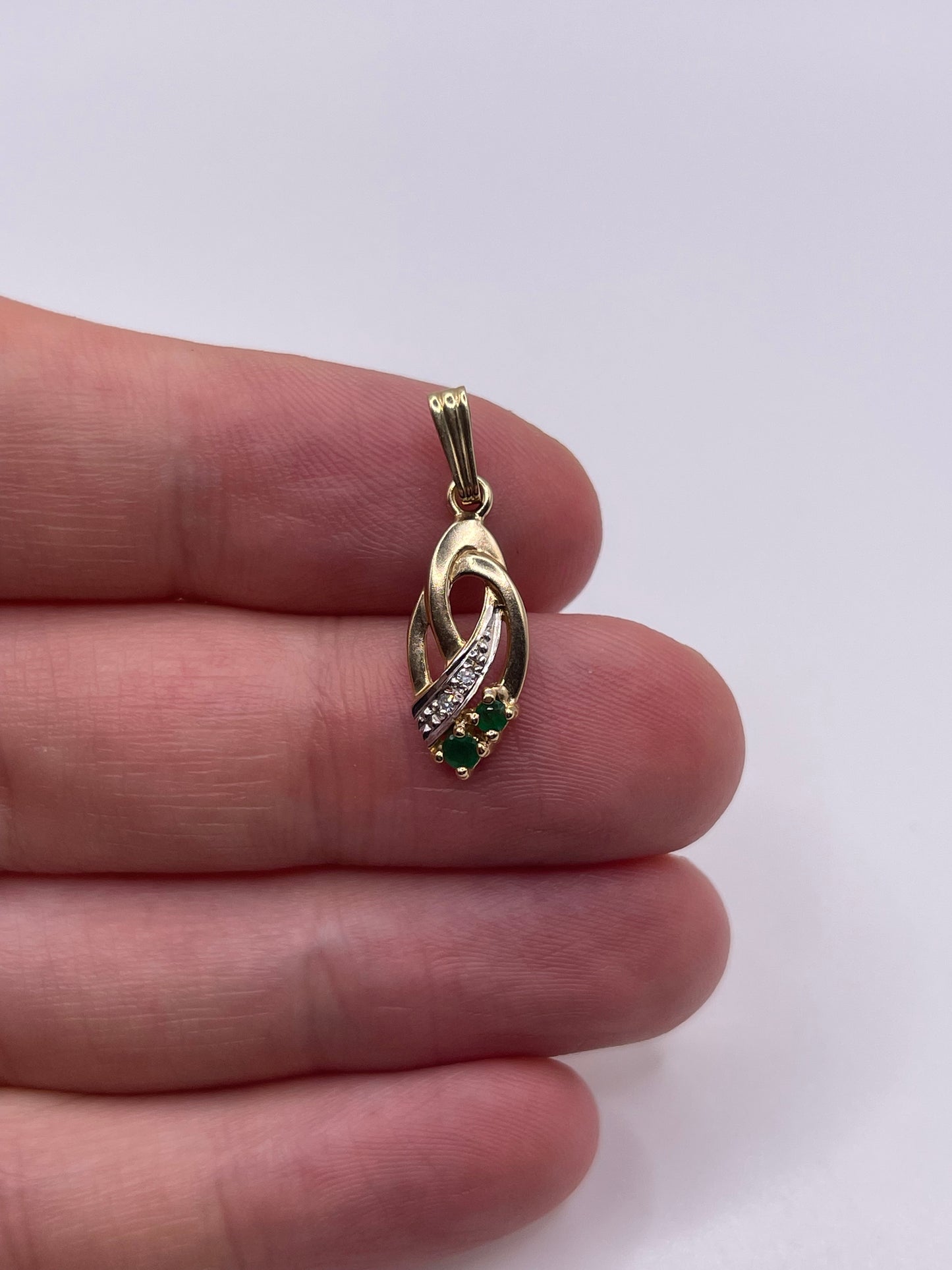 9ct gold emerald and diamond pendant