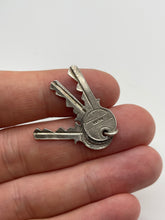 Load image into Gallery viewer, Silver keys charm
