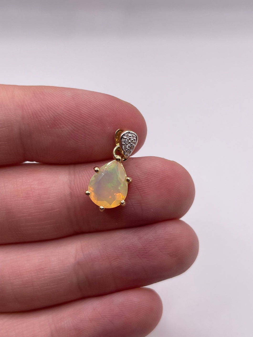 9ct gold opal and zircon pendant