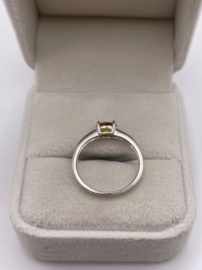 9ct white gold orange sapphire and diamond ring