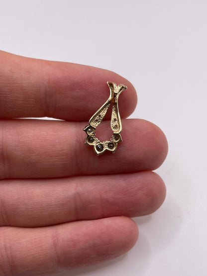 9ct gold emerald and diamond pendant