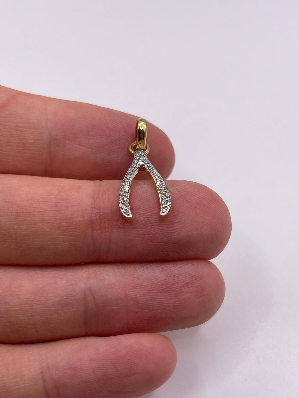 18ct gold diamond wishbone pendant