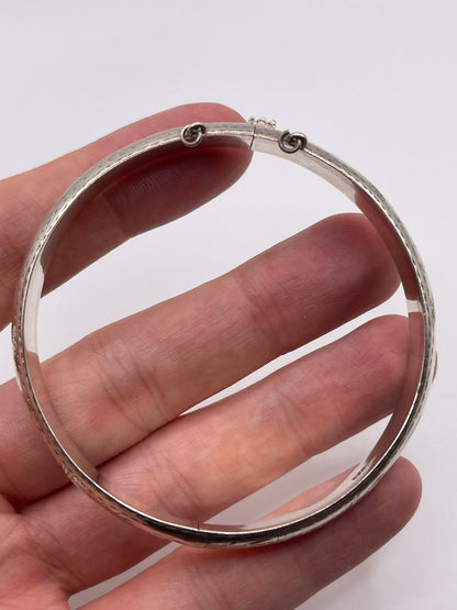 Engraved silver bangle