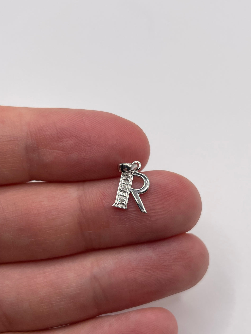 9ct white gold diamond initial R pendant
