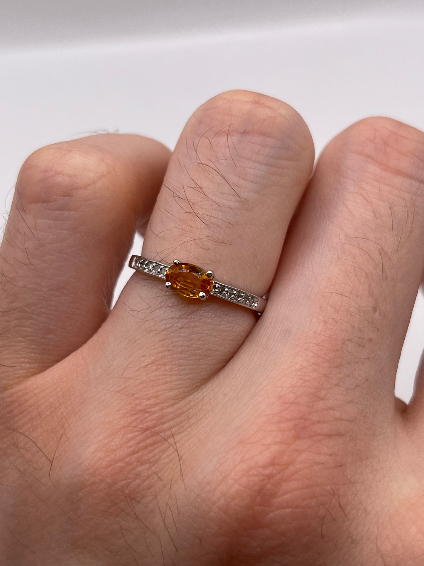 9ct white gold orange sapphire and diamond ring