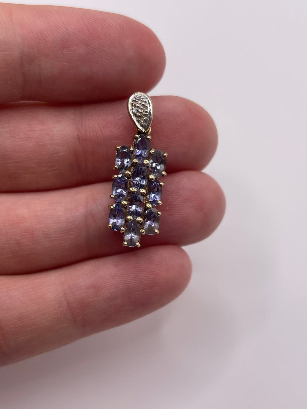 9ct gold tanzanite and diamond pendant