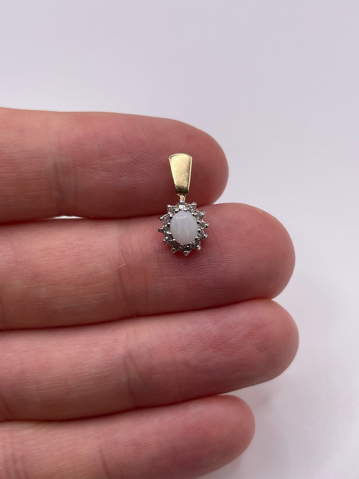9ct gold opal and diamond pendant