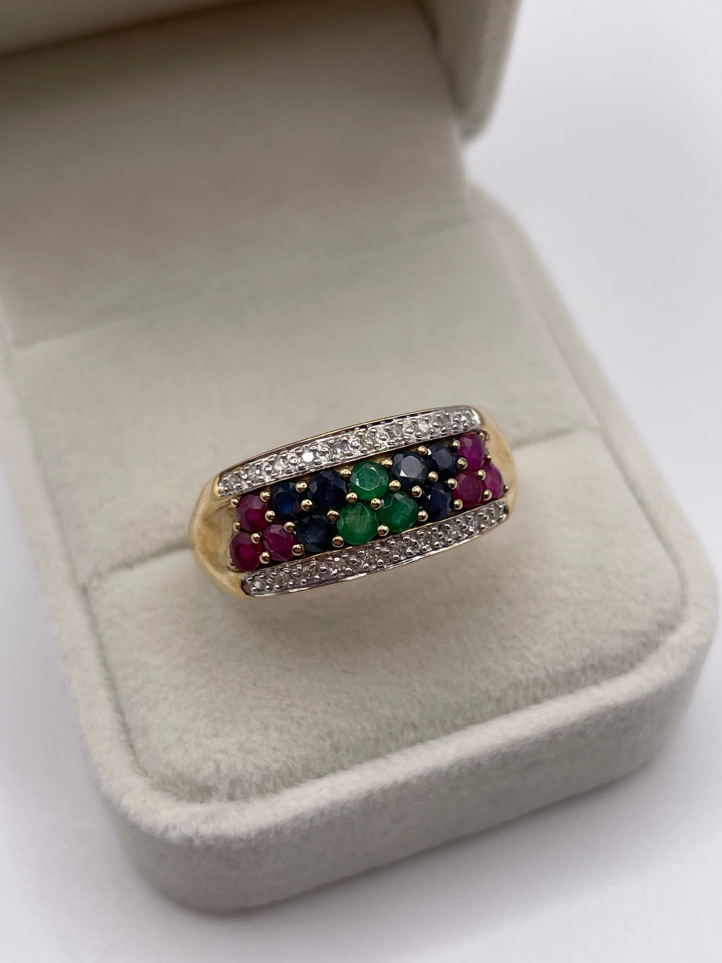 9ct gold emerald, sapphire, ruby and diamond ring