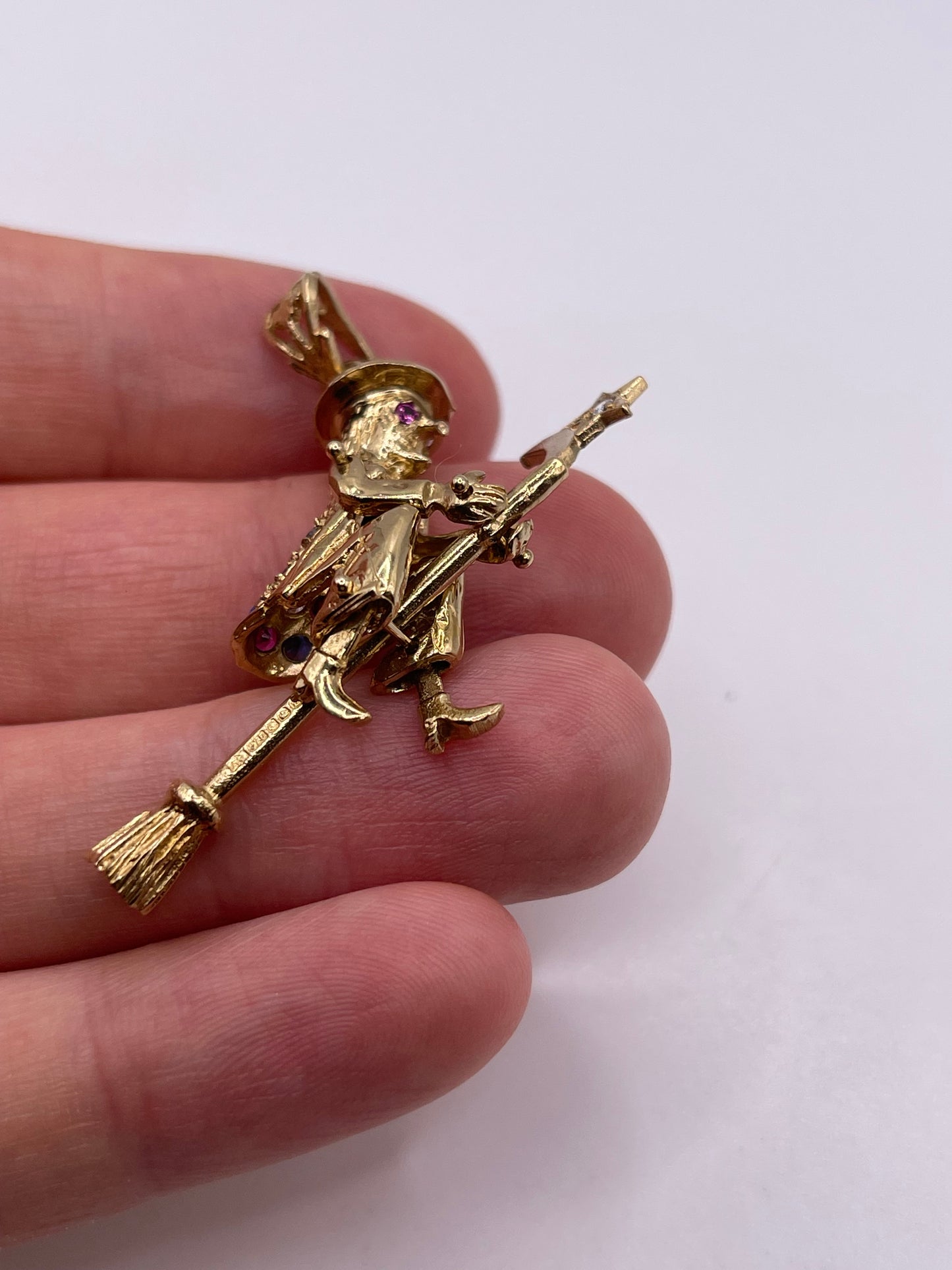 9ct gold articulated witch pendant