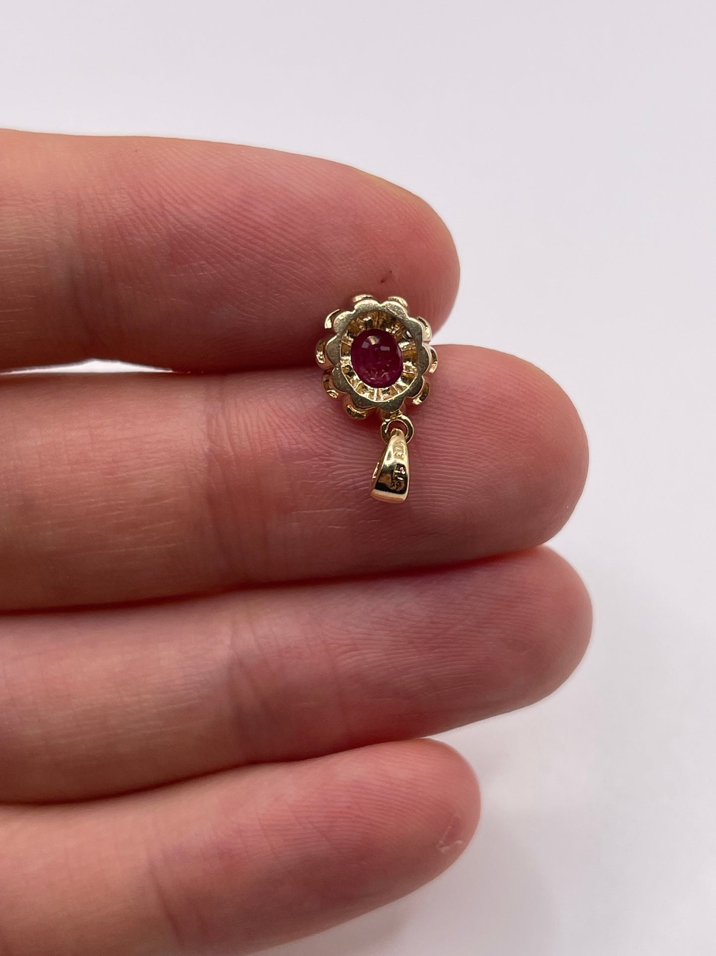 9ct gold ruby and diamond pendant