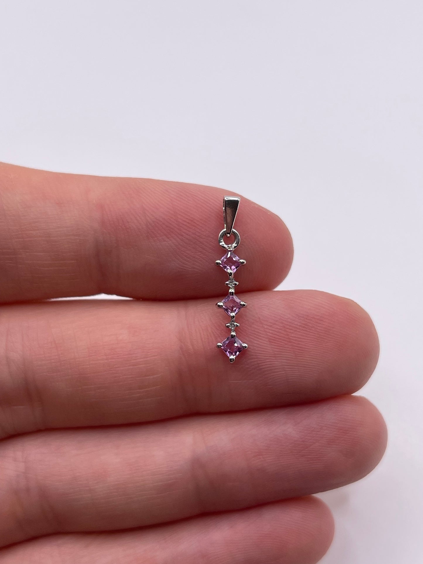 9ct white gold pink sapphire and diamond pendant