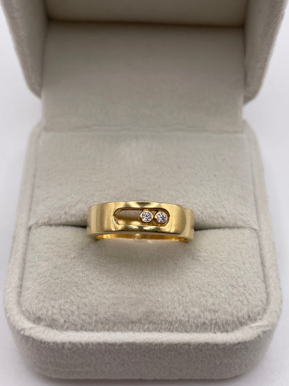 18ct gold cz moving ring