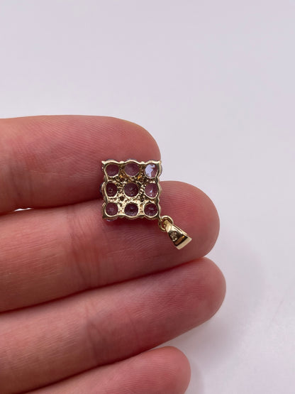 9ct gold tanzanite and diamond pendant
