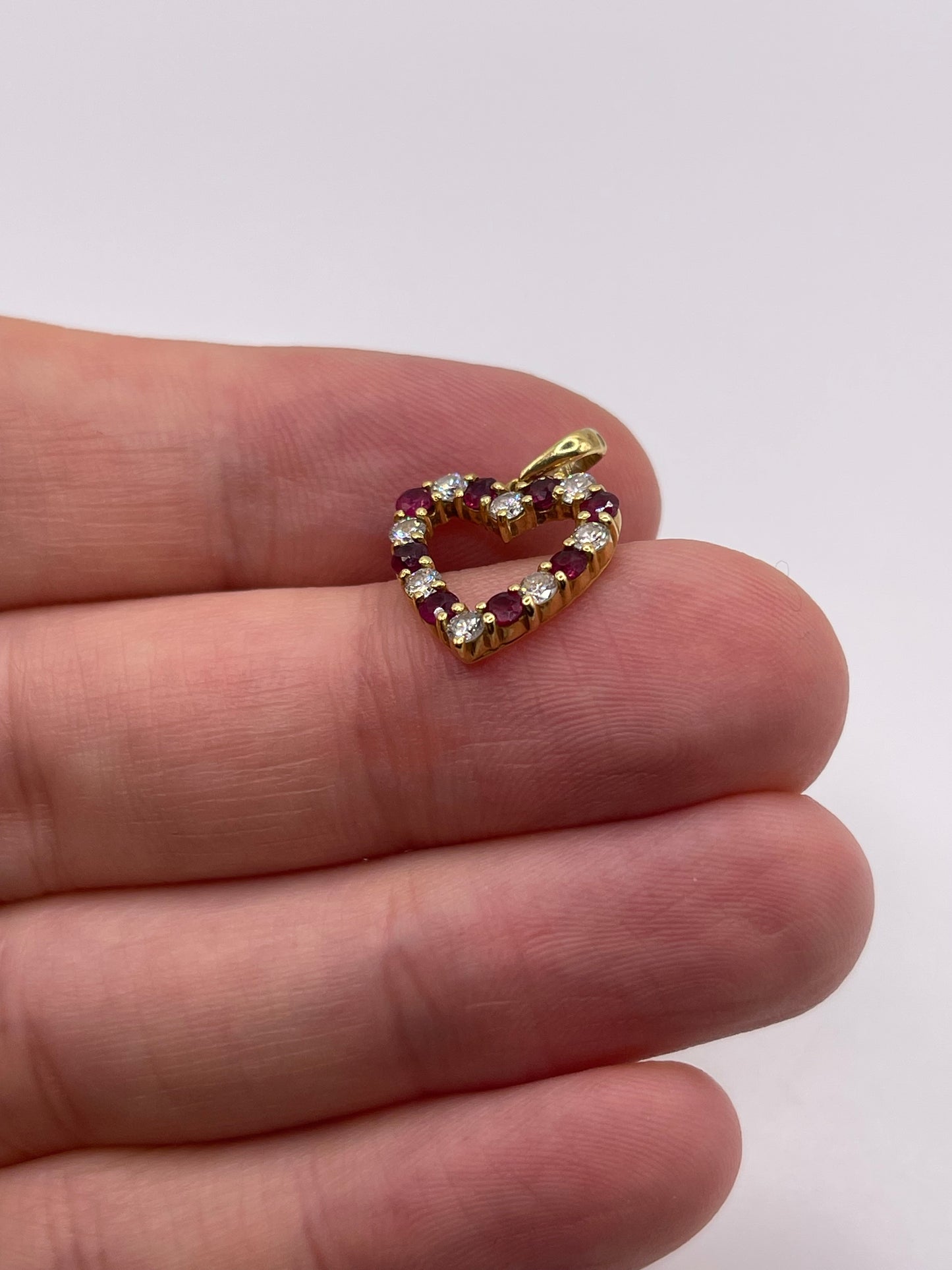 18ct gold ruby and diamond heart pendant