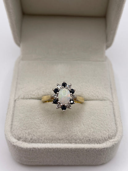 18ct gold opal and sapphire ring