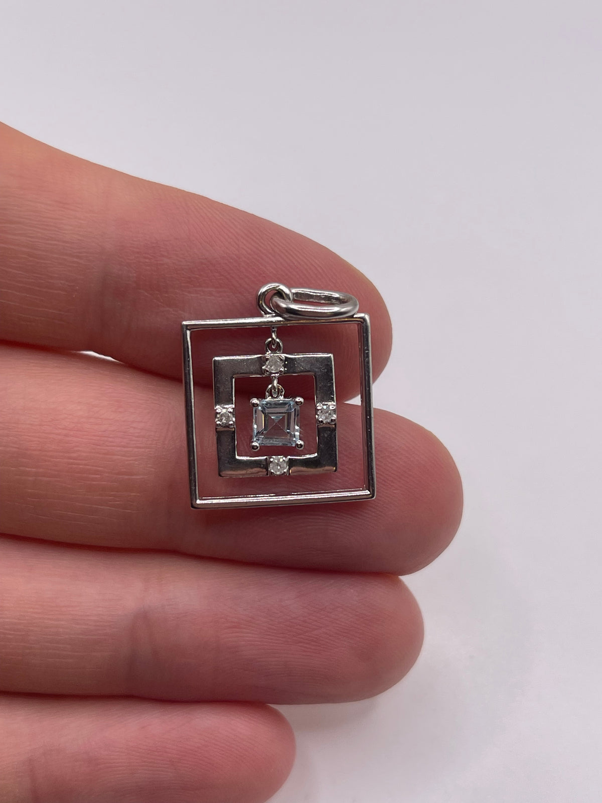 9ct white gold aquamarine and diamond pendant